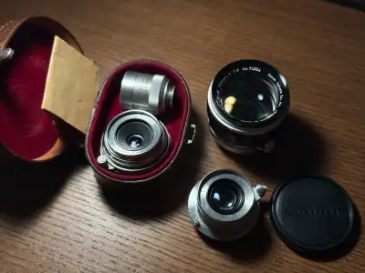 Canon 50mm f1.4. In great shape, very small haze on the front element edges. 280$ Canon 28mm f3.5. I...