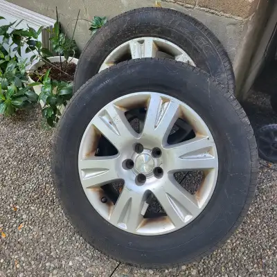 Aluminum rims and summer tires used on Subaru Outback 225/60 R16