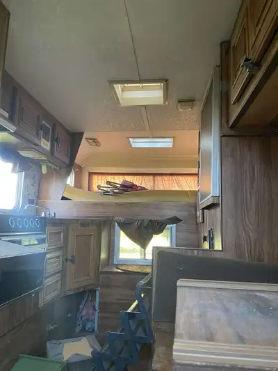 Vanguard camper 1000 bucks firm , no leaks, stove doesn’t work, but it’s a great camper family out g...