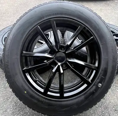 set of like brand new Rims and winter Tires will fit most of SUVs cars and many more sedan models al...