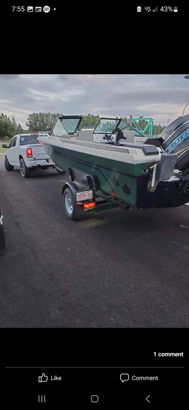19 foot trihull, easy loader trailer and 150 HP Mercury motor