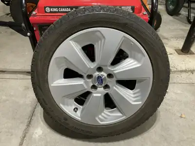 New winter Toyo Tires. 5 lug nut holes with a spacing of 100 mm (4 inch). Fell free to text me if yo...