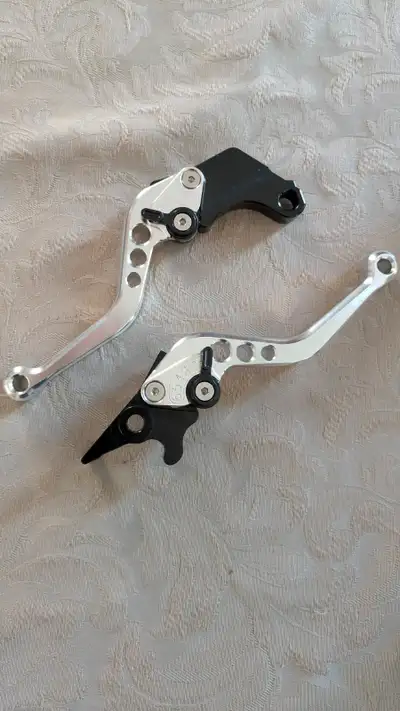 Adjustable/Universal Brake Levers. I had bought these for a Honda CBR but sold it before I got aroun...