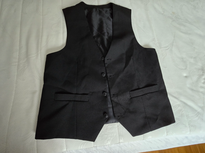Mens size medium black vest in excellent condition. Only worn a couple of times. Purchased from Inte...