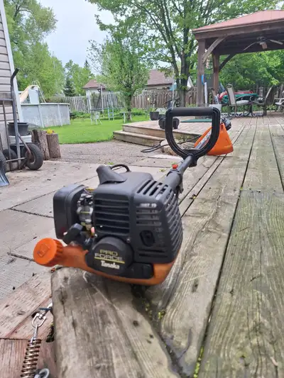 Tanaka Pro Force TBC 250- strait long shaft- strong machine- very good working cond.- new trimmer he...