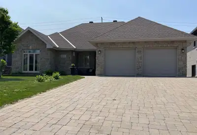 Welcome to 9 Zephyr Heights, a beautifully built 3-bedroom, 2-bathroom slab-on-grade bungalow, craft...