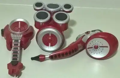 Summit Products Inc.2006 Battery Operated Drum Kit, Guitar and Saxophone all in excellent working co...