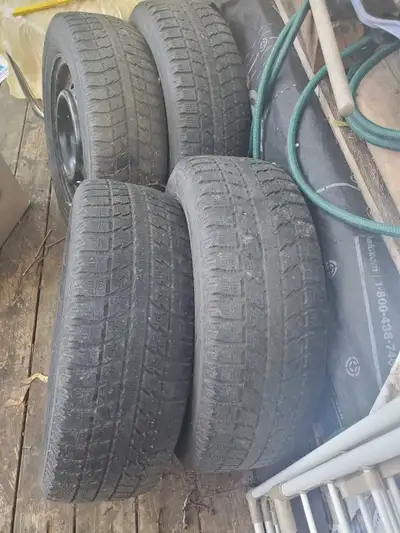 I am selling a set of four Toyo Observe GSi-5 winter tires in the size 195/65R15, mounted on steel w...