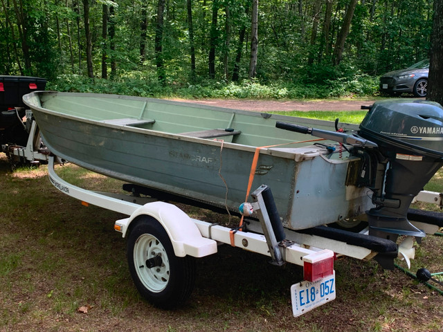 14 ft Starcraft with Yamaha 15 hp four stroke outboard motor in Powerboats & Motorboats in Renfrew