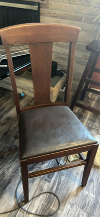 Antique leather seat chairs 