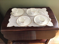 Salisbury English China, cup on luncheon plate, set of four.