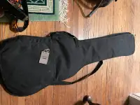 guitar case with back pack straps and outer pocket