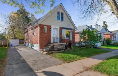 The home features a modern layout with updated flooring, pot lights, quartz countertops, central air...