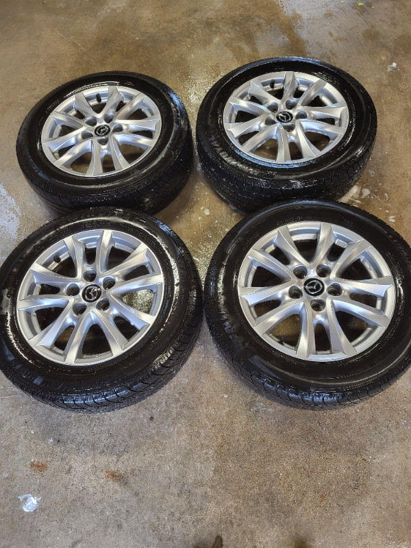 Mazda aluminum rims with tires in Tires & Rims in Bedford - Image 2