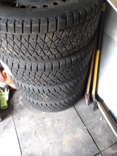 BRIDGESTONE WINTER TIRES/RIMS 245 65 R17 OFF OF A 2010 TOYOTA VENZA $350.00 CALL OR TEXT 647-991-149...