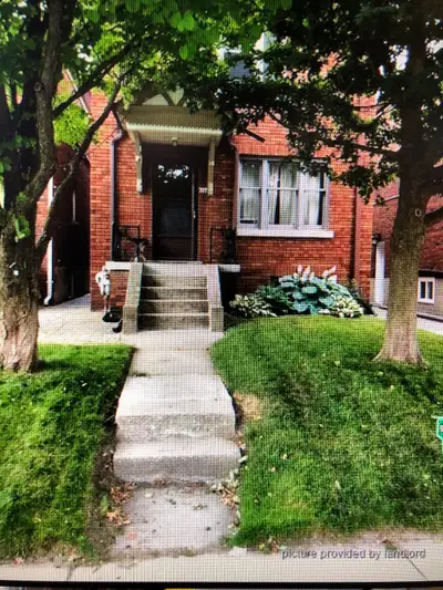 Main floor apartment in Triplex. Bright living room, spacious bedroom, small area outside of the kit...