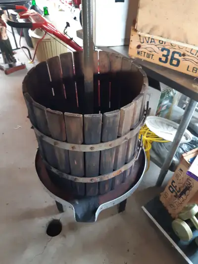 Press used in private wine making. Press is 20 inch diameter by 20 inches high. Sits on its own stan...