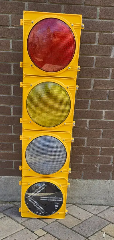 Authentic traffic light. Never installed. Red, yellow, green, and arrow. 54" tall x 14" wide x 8" de...