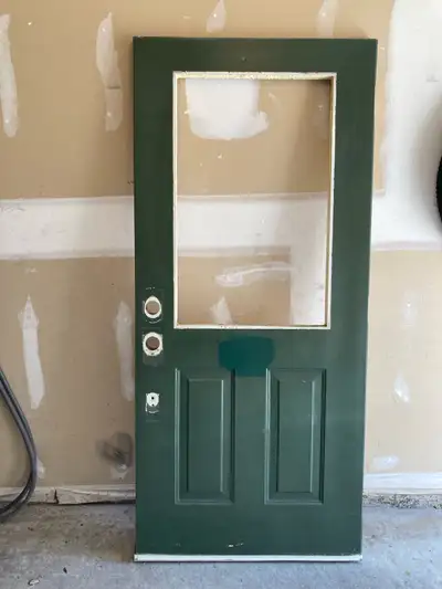 Used insulated steel entry door. Does not come with glass. Door Dimensions: 35 3/4 x 79 Window cutou...