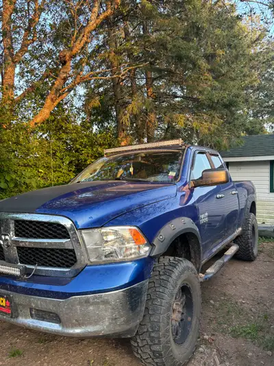 2014 ram 1500 lifted 6 inches on 37s asking 12000 obo