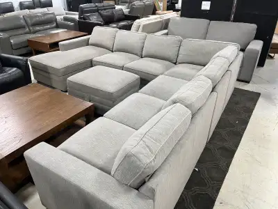 floor model large sectional w ottoman $1950, View more