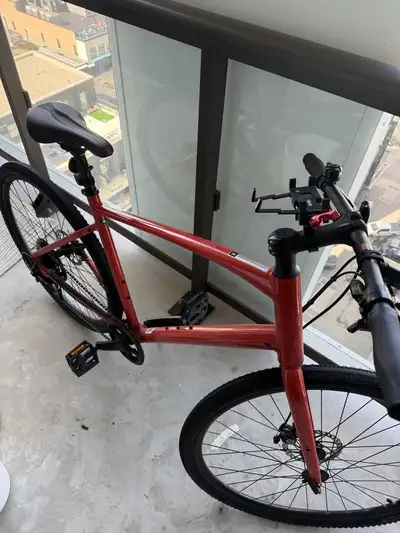 Specialized Sirrus X 1.0 hybrid / commuter bike in red-orange. REPAIRS NEEDED: brake pads need repla...