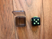 Fidget cube with case.