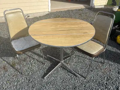 Round Table and Two Chairs, View more