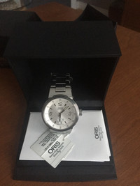 Swiss Made Automatic Men's Watch by Oris ‘NEGOTIABLE”