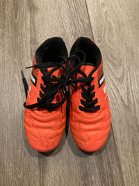 Kids size 12 orange soccer kleats