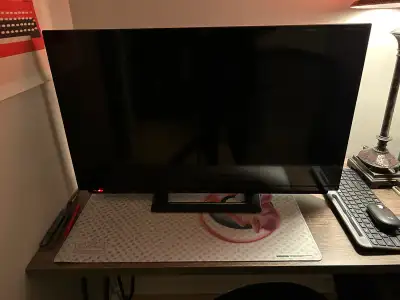 I'm selling a 32-inch Sharp TV, a Full HD 1080p LCD television, model number LC-32LB261U, that deliv...
