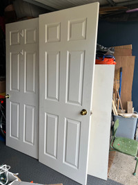 White wood doors / bedroom or closet, basement 