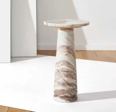 Gorgeous designer solid marble end table. Cream/grey/beige tones. Adds so much character to a room a...