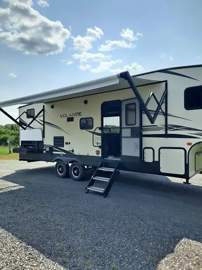 Trades considered. Two bath, bunk model 2019 31 foot Volante 270BH, Still smells like new. Modern st...