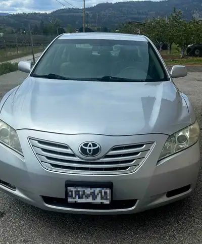 Selling my 2009 Toyota Camry LE. Silver, 4-door, automatic, gas, and front-wheel drive. 248,756 km....