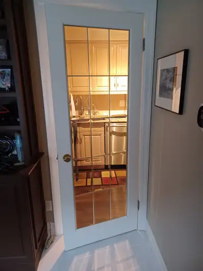 Double Doors 56" x 80", privacy etched glass Single Door 30x80, clear glass Brass trim. Brass hardwa...