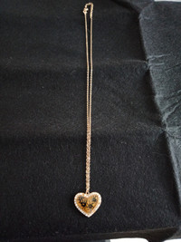 Diamond heart  necklace with native design