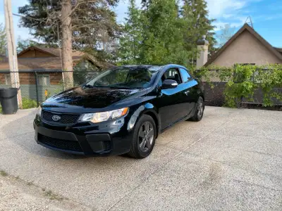 2010 Kia FORTEX EX Low Kms’ only 130,000kms FWD,4 cyl , 5 speed , remote starter , winter tires on r...