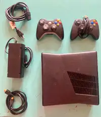 Xbox 360 with controllers and games