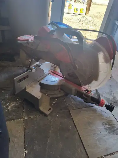 Used 12" Milwaukee saw comes with stand. Works good and it's in good condition.