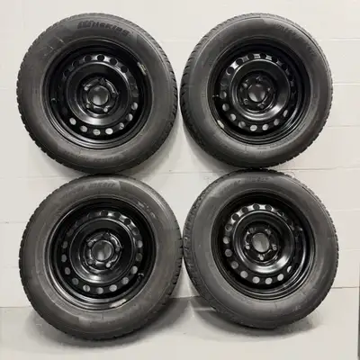 Set of four winter tires mounted on black steel rims. Used, good condition. Rims size: 15”, bolt pat...