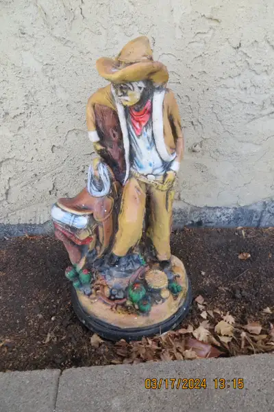 Cowboy lawn ornament, View more
