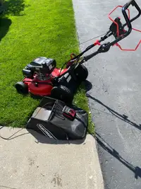 Electric start self propelled lawnmower