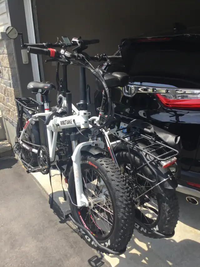 NEW PRICE - HIS AND HERS E-BIKES AND CARRIER62863275627138123