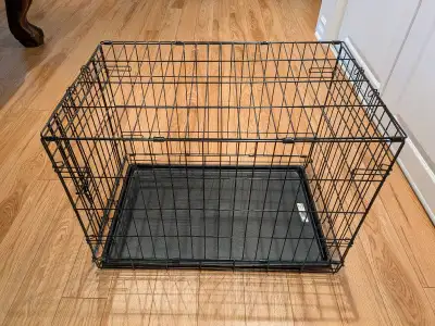 CAGE PLIANTE MIDWEST POUR CHIEN AVEC UNE PORTE .CHIEN MOYEN JUSQU'À 20 POUCES DE HAUTEUR ET 24 POUCE...