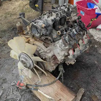 Running 4.8 l engine 500 $obo Brand new right front fender 250.00$ obo White - front left fender 75$...