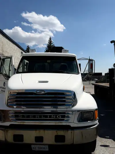 2004 Sterling flatbed 24’ long Great condition. Original owner. Heavy duty truck. No longer need the...