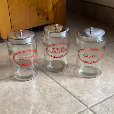 Beautiful Set of Apothecary Jars. About 7.5in in height. In excellent condition. If Ad is up, item i...