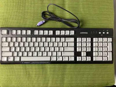 Compaq brand wired PS/2 keyboard, black/gray, View more