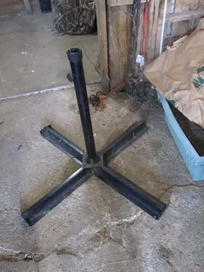 umbrella stand. asking $1. if interested call or text me at 705 559 6493